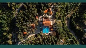 an aerial view of a house in the woods at Zuzumbo Resort & Spa in Tʼelavi