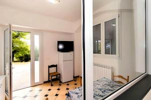 Μια τηλεόραση ή/και κέντρο ψυχαγωγίας στο Villa Tigullio