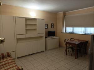 Kuchyň nebo kuchyňský kout v ubytování Residence Le Arcate