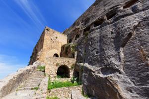an old building on the side of a mountain at Casa Dolce Casa in Enna