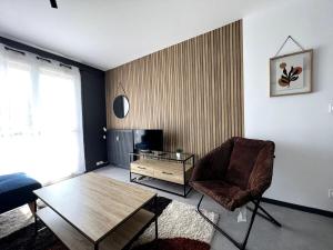 Μια τηλεόραση ή/και κέντρο ψυχαγωγίας στο Calme & cosy - parking