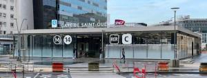 a building with a sign on it in a city at GoodGuest-Cosy Apartment New Bulding Clichy-4 PAX in Clichy