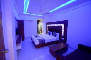 HOTEL GREEEN LEAF客房内的一张或多张床位