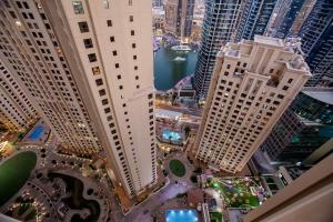 an aerial view of a city with tall buildings at Berloga Capsule JBR in Dubai