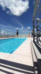 a swimming pool on the roof of a building at Santiago in Paraná