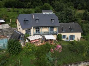 an aerial view of a large house on a hill at chambres d'hôtes las Vignes in Beaucens