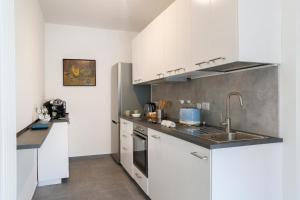 Kuchyň nebo kuchyňský kout v ubytování Villa Eugenia Suite - by MyHomeInComo