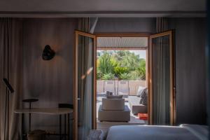 Postel nebo postele na pokoji v ubytování Unique Boutique Hotel Antibes Juan-les-Pins + 37 fotografií