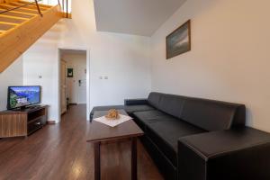 TV a/nebo společenská místnost v ubytování Hotel Liptov Holiday ***
