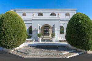 The facade or entrance of Lindos Village Resort & Spa - Adults Only