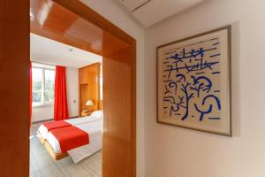 Postel nebo postele na pokoji v ubytování Albani Hotel Roma