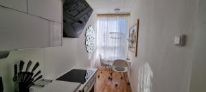 TV a/nebo společenská místnost v ubytování Sluníčkový apartmán A9 v Chomutově
