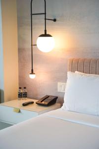 Voodi või voodid majutusasutuse Hotel 1000, LXR Hotels & Resorts toas