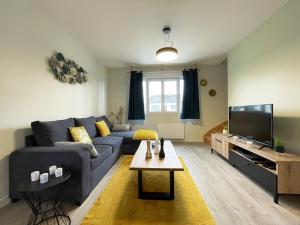 Area soggiorno di Maison pour 6 personnes à Champhol
