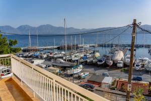 a marina with boats parked in a marina at Jelena Apartments By The Sea in Agios Nikolaos