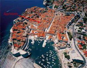 an aerial view of a city with boats in the water at Tailor Apartment with a Private Terrace in Dubrovnik
