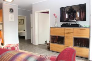 TV a/nebo společenská místnost v ubytování Haus Sonne