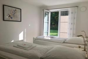 Postel nebo postele na pokoji v ubytování Haus Sonne