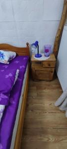 Ein Bett oder Betten in einem Zimmer der Unterkunft Etno smeštaj Stojadinović