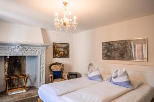 Postel nebo postele na pokoji v ubytování Guesthouse Arosio B&B