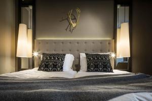 Postel nebo postele na pokoji v ubytování Lapland Hotels Oulu