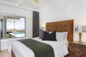 Ένα ή περισσότερα κρεβάτια σε δωμάτιο στο Atlantic Sky Villa +24 φωτογραφίες