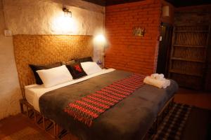 Letto o letti in una camera di Hira Guest House