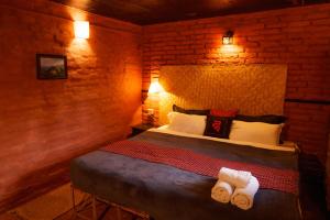 Letto o letti in una camera di Hira Guest House