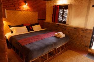 Letto o letti in una camera di Hira Guest House