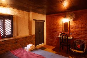 Letto o letti in una camera di Hira Guest House