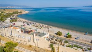 an aerial view of a beach and the ocean at LIVAS Corinth Seaside Family Apartment in Korinthos
