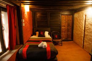 Letto o letti in una camera di Hira Guest House