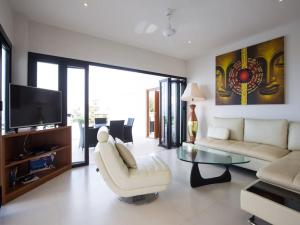 a living room with a couch and a table at 2 Bed Seaview Villa 5 mins to beach A2 SDV202-By Samui Dream Villas in Koh Samui 