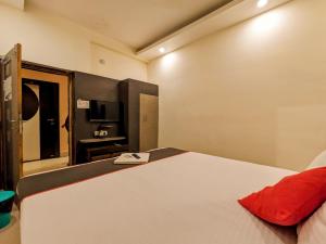 Postel nebo postele na pokoji v ubytování HOTEL SUN CITY