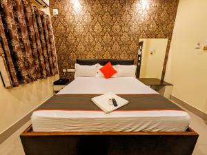 Postel nebo postele na pokoji v ubytování HOTEL SUN CITY