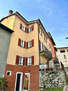 a building with a sign in front of it at Guesthouse Arosio B&B in Arosio