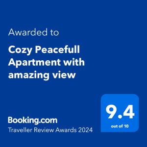 una pantalla azul con el texto otorgado a una acogedora cita pacífica con una vista increíble en Cozy Peacefull Apartment with amazing view en Stara Zagora