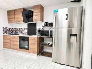 Kuchyň nebo kuchyňský kout v ubytování Le Grand Penon ~ Logement Spacieux à 6 min du Parc