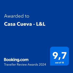 a blue screen with the text awarded to casa cova iclil at Casa Cueva - L&L in Santa Cruz de Tenerife
