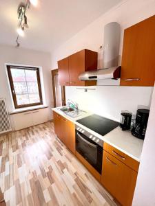 a kitchen with a sink and a stove top oven at Monteurwohung Leoben, Uni, LCS in Judendorf