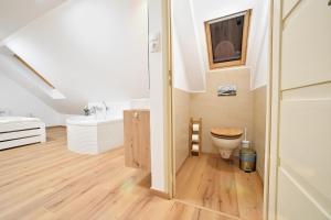 Kúpeľňa v ubytovaní Palmy Apartmanhouse Maglód