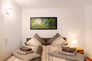 Postel nebo postele na pokoji v ubytování Schwarzwaldnestle + 10 fotografií