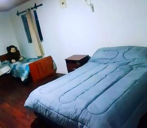 Säng eller sängar i ett rum på María Chusena alojamiento 3