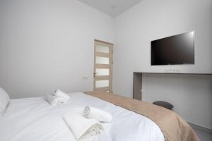 Voodi või voodid majutusasutuse Hotel Armeni toas