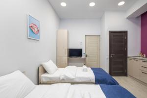 Voodi või voodid majutusasutuse Hotel Armeni toas