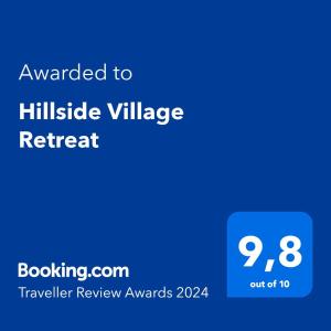 Certifikat, nagrada, logo ili neki drugi dokument izložen u objektu Hillside Village Retreat