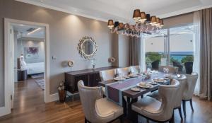 a dining room with a table and chairs at Rixos Premium Tekirova - The Land of Legends Access in Tekirova