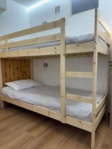 a couple of bunk beds in a room at Residence Fonte Eremita in Roccaraso