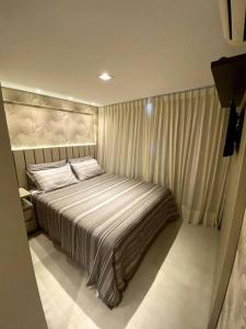 Кровать или кровати в номере Barra Grande Exclusive Residence