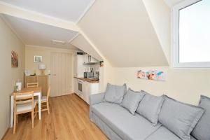Kuchyňa alebo kuchynka v ubytovaní Palmy Apartmanhouse Maglód